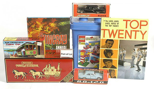 A Group of Diecast Toys & Plastic Kits: Diecast Toys, plastic Kits - including Tomica Dandy No.035 Bus, Rio No.64 German Staff Car, 3 x Russian Cars plus others, 2 x Revell Kits one Queen Mary, one Titanic, Annuals, Lego, Magic Set, Trade P