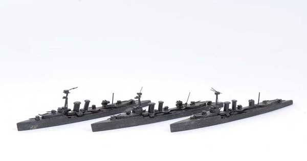 Bassett-Lowke - A Group of 3 x Warships: Bassett-Lowke wooden Waterline Ships a group of 3 Warships, HMS "Ceres". Built to 1/200th scale and all overpainted black but with Bassett-Lowke labels to base - all Good Plus. (3)