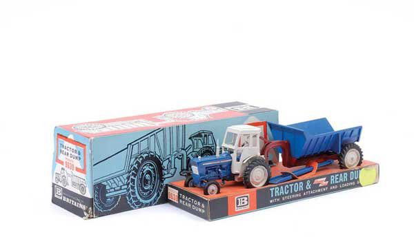 Britains No.9630 Ford 5000 Tractor: Britains No.9630 Ford 5000 Tractor with rear Dump Trailer - blue, grey, maroon, complete with accessories - although overall condition is generally Excellent Plus does have slight hub reaction to tyre