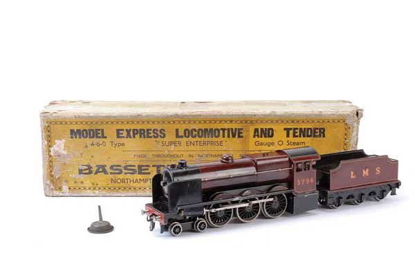Bassett-Lowke 4-6-0 "Super Enterprise" No.5794: Bassett-Lowke O Gauge 4-6-0 Loco and Tender "Super Enterprise" LMS maroon No.5794. The Loco has been fired on a number of occasions with scorch marks to running plate and boiler. Overall condition Fai