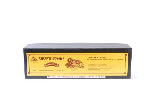 Corgi (Bassett-Lowke) 2-6-0 Loco & Tender #2945: Corgi (Bassett-Lowke) O Gauge 2-6-0 Loco and Tender LMS maroon No.2945, Live Steam. Built in original factory wrapping, appears unused, Near Mint to Mint boxed.