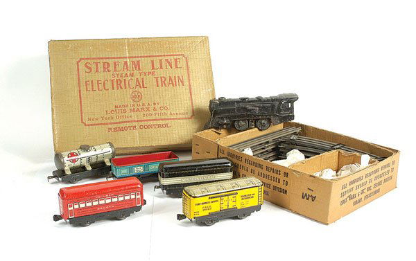 Marx Toys (USA) Streamline O Gauge Train: Marx Toys (USA) Streamline O Gauge electric train - set comprises 0-4-0 Loco which is black with centre rail pick-up, carriages comprise Oil Tank, Rock Island Open Wagon, Fruit Growers Express Van, Ne