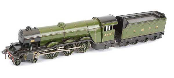 Bassett-Lowke 4-6-2 "Flying Scotsman" No.4472: Bassett-Lowke O Gauge 4-6-2 Loco and Tender LNER green "Flying Scotsman" No.4472, Clockwork. Overall condition is generally Good Plus to Excellent.