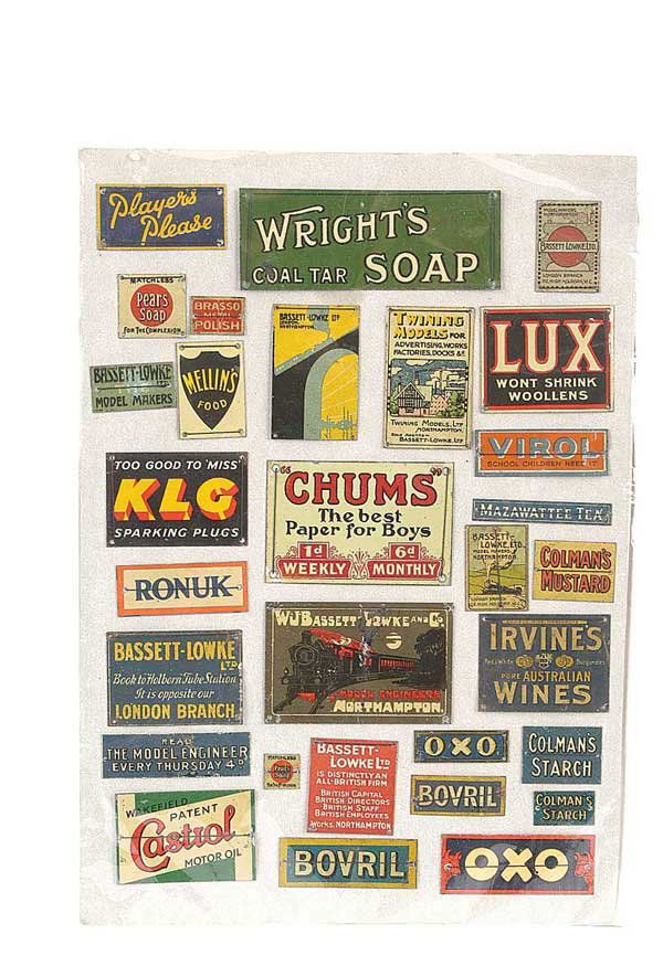 Bassett-Lowke Enamel Signs: Bassett-Lowke enamel signs consisting of Wrights Coal Tar Soap, Twinnings Models, Bassett-Lowke Northampton, Bassett-Lowke London, 3 other Bassett-Lowke signs and a quantity of others. Condition is ge