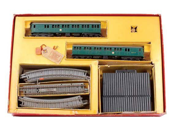 Triang RF Suburban Passenger Train Sets: Triang RF Suburban Passenger Train Sets containing SR green EMU Power Car, SR green EMU non-powered Car, oval of standard grey track along with battery controller OO/HO plastic Triang badge, empty oil