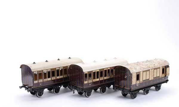 Carette/Bassett-Lowke Clemenson 6-wheel Coaches: Carette for Bassett-Lowke Gauge 1 trio of Clemenson 6-wheel Coaches consisting of 1st 3rd running number 13212 x 2 and all 3rd Brake Coach No.13312. All have had some modification to the centre set of