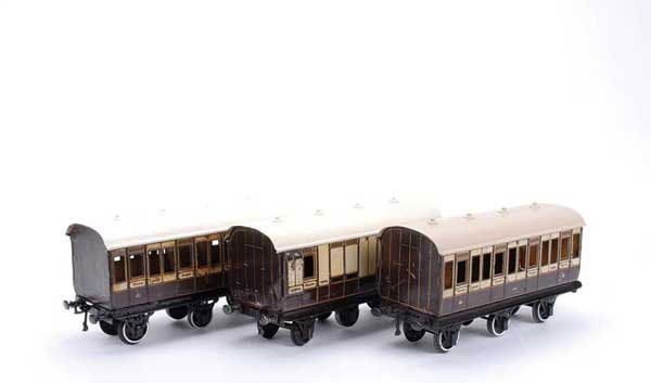 Carette/Bassett-Lowke Clemenson 6-wheel Coaches: Carette for Bassett-Lowke Gauge 1 trio of Clemenson 6-wheel Coaches consisting of 1st 3rd running number 13212 x 2 and all 3rd Brake Coach No.13312. All have had some modification to the centre set of