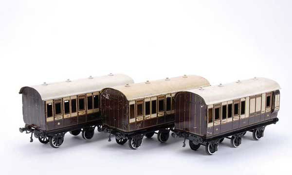 Carette/Bassett-Lowke Clemenson 6-wheel Coaches: Carette for Bassett-Lowke Gauge 1 trio of Clemenson 6-wheel Coaches consisting of 1st 3rd running number 13212 x 2 and all 3rd Brake Coach No.13312. All have had some modification to the centre set of