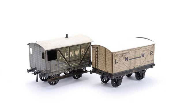 Carette/Bassett-Lowke 4-wheel LNWR Goods Wagons: Carette/Bassett-Lowke Gauge 1 4-wheeled LNWR Goods Wagons consisting of Refrigerator Van and a Brake Van. Sides are generally Good to Excellent, roofs Good. (2)