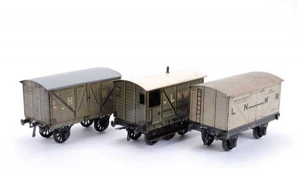 Carette/Bassett-Lowke LNWR 4-wheel Goods Wagons: Carette for Bassett-Lowke Gauge 1 LNWR 4-wheeled Goods Wagons consisting of Refrigerator Van, Closed Van and a 6-wheel Brake Van. Condition is generally Good to Good Plus, roofs Good. (3)