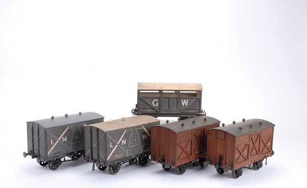 Bassett-Lowke & Other Goods Wagons: Bassett-Lowke and other commercially manufactured Gauge 2 4-wheeled Goods Wagons consisting of LNWR Covered Van, Great Western Cattle Truck and 2 x NE Fisher Vans. All fitted with Gauge 1 wheels. Over