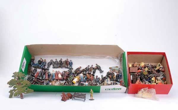 Bassett-Lowke & Other Railway Passengers & Staff: Bassett-Lowke/Britains and other commercial manufactured Railway Passengers and Staff consisting of railway staff x 12, 30+ passengers including a small quantity of seated figures, 9 milk churns and a