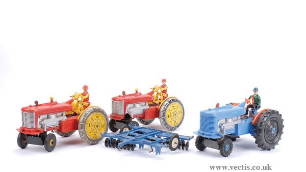 Marx Toys - A Group of Tricky Tommy Tractors