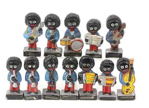 Robertsons Golly - 12 x Musician Chalk Figures: Robertsons Golly twelve musician chalk figures: (1) Singer; (2) Drummer; (3) Clarinet; (4) - (6) Trombone; (7) - (9) Accordion; (10) Double Bass; (11) - (12) Guitarist, some chips, mainly Good. (12)