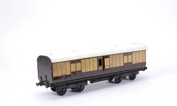 Bing/Bassett-Lowke LNWR Brake End Coach No.1332: Bing for Bassett-Lowke Gauge 1 LNWR Brake End Coach No.1332. Sides are generally Good to Good Plus although there has been some over varnishing.