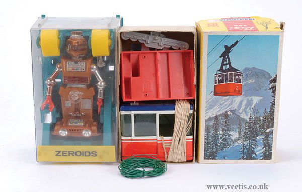 Ideal Zeroids Zobor Plastic Robot: Ideal Zeroids Zobor (Hong Kong) plastic Robot, 1968, not checked for completeness, appears Good within Good perspex case, 7"/18cm; plus Lehmann Rigi 900 tinplate Cable Car, boxed, Good. (2)