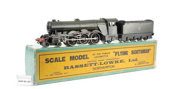 Bassett-Lowke 4-6-2 BR Green "FLYING SCOTSMAN": Bassett-Lowke O Gauge 4-6-2 Loco and Tender BR green "FLYING SCOTSMAN" 60103, 3-rail Electric. Overall condition is generally Excellent Plus to Near Mint in a Good box. Included with this lot is an ov