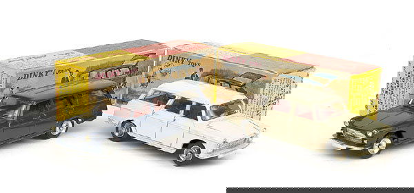 French Dinky 2 X No.525 Peugeot 404 Estate: 2 X No.525 Peugeot 404 Estate (1) cream, red interior, spun hubs - Good Plus in Good Plus detailed picture box (minor graffiti). (2) dark blue, red interior, spun hubs (rear seat detached and damaged)