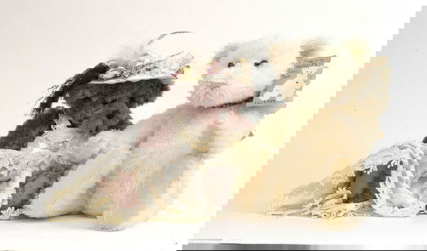 Two Gund teddy bears: Lavender N' Lace & Patric: Two Gund teddy bears: a Barton's Creek/Rosalie Frischmann Lavender N' Lace teddy bear, plum plush, all tags, 15"/38cm; a Patric teddy bear, celebrating America's 100 years of hugs, all tags, 15"/38cm.