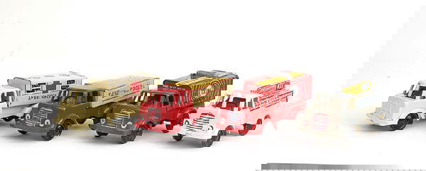 Pocketoys - a group of Forward Control Lorries: Pocketoys - a group of Forward Control Lorries - (1) "Drink More Milk" Truck - cream cab and chassis, blue milk bottle load, (2) Ambulance - cream, (3) Sand and Gravel - red, cream rear body and (4) T