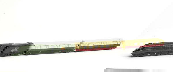 Dinky No.798 Express Passenger Train Set: No.798 Express Passenger Train Set consisting of green, black loco with BR crest and 2 cream and maroon Coaches - beige ridged hubs - Excellent.