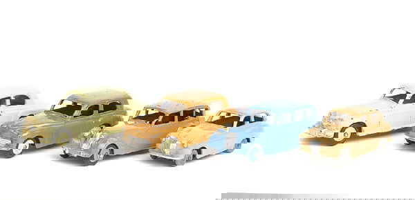 Dinky - A group of 1950s Motor Cars: A group of 1950s Motor Cars (1) Rover 75 - cream including ridged hubs, (2) Austin A30 - beige, grey smooth wheels, (3) Hillman Minx - tan, pale yellow wheels, some wear particularly to edges of roof