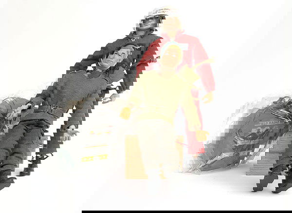 Palitoy A Palitoy Action Man: A Palitoy Action Man, brown moulded hair, blue painted eyes, rigid hands, slight cracking to knees, slight rubbing to facial features and hair, wearing Red Devil jump-suit, boots, helmet, reserve para