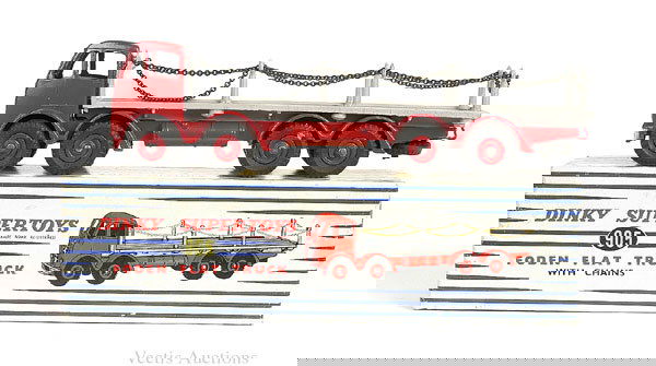 Dinky No.905 Foden Flat Truck with Chains: No.905 Foden Flat Truck with Chains - red 2nd cab chassis and Supertoy hubs, grey flatbed with chain posts and chain (attached with small nut and bolt) very light retouching to a couple of wing edges