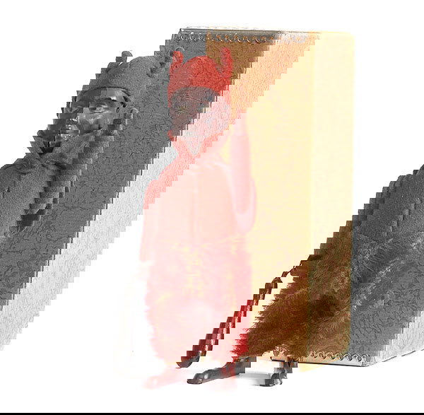 An extremely rare Schuco clockwork Devil: An extremely rare Schuco clockwork Devil - 1930s - the dark red metal face with painted side-glancing eyes, mohair legs and felt clothed body and horned hood, chenille tail, twirling truncheon to righ