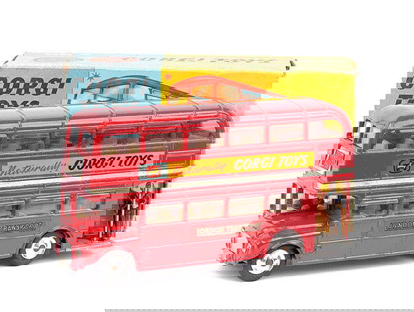 Corgi No.468 London Routemaster Bus "Corgi Toys": Corgi No.468 London Routemaster Bus "Corgi Toys" - red, ivory interior, driver and clippie figures, spun hubs - Good Plus to Excellent in Good grubby blue and yellow box.