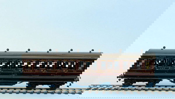 Carette/Bassett-Lowke Side Corridor Coach: Carette for Bassett-Lowke 1921 Series GWR liveried all 1st Side Corridor Coach running number 132. Slight loss of detail to running board, nevertheless, Region, Class and running number finished in go