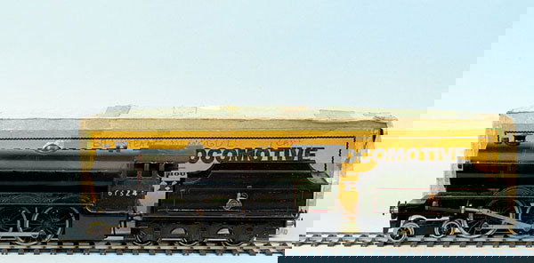 Bassett-Lowke 4-6-0 "Super Enterprise" No.61324: Bassett-Lowke 4-6-0 Loco and Tender BR green "Super Enterprise" No.61324, Live Steam. Some scorching to boiler sides and repainting to burner unit, cab roof and loco cab sides. Good. Tender with lion