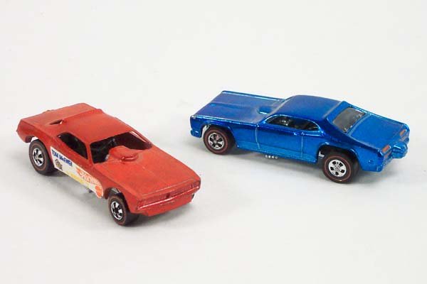 Hot Wheels No. 5954 Mongoose &No. 6410 Mongoose: Hot Wheels. No. 5954 metalflake blue Mongoose 2 w/rsw (chips & missing 1 side label) plus No. 6410 red Mongoose w/rsw (incorrect labels from Mongoose II). (2) Lot Condition- B,B. Box Condition- U,U