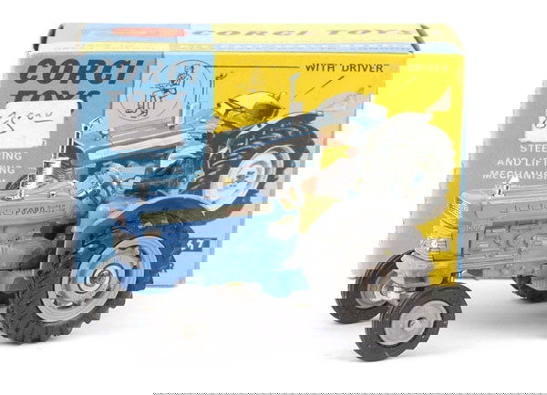 Corgi No.67 Ford 5000 Super Major Tractor: Corgi - No.67 Ford 5000 Super Major Tractor - Excellent (paint chips to mudguards painted in) in generally Good Plus blue and yellow scarce late issue 1970 copyright date box complete with inner card