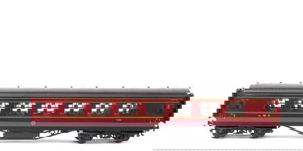 Exley K6 Bassett-Lowke Side Corridor Coach: Exley K6 plastic bodied Bassett-Lowke bogied LMS all 1st Side Corridor Coach No.4502. Excellent Plus complete with original corrugated wrapper.