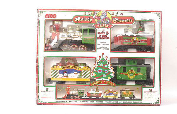 Echo Gauge 1 2-6-0 "Melody Christmas Train": Echo Gauge 1 2-6-0 Loco and 4-wheel Tender "Melody Christmas Train" Loco and 4-wheel Tender. Included with this lot is a 4-wheel Open Wagon with Santa Claus and a 4-wheel Caboose. This is a battery op