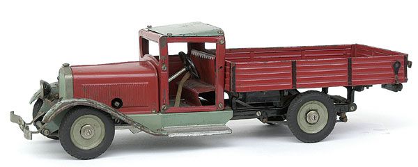 Large Open-backed Lorry by Marklin, No.1105L: Large tinplate Open-backed Lorry by Marklin, No.1105L - constructional toy of nut and bolt construction, red, green, quality clockwork operation with universal shaft driving rear wheels, steerable fro