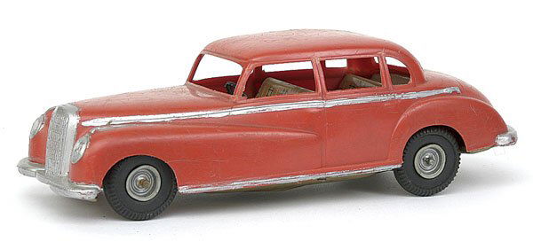 Tin & Plastic post-war Mercedes 4-door Saloon: A tinplate and plastic model of a post-war Mercedes 4-door Saloon - orange, silver detail, tinplate baseplate with detailed tin printed interior, rubber tyres, some wear to plastic but would benefit f