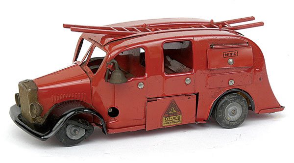 Minic - 62M Fire Engine - Post-war - red + black: Minic - 62M Fire Engine - Post-war version - red with black wings - plated radiator - diecast hubs with black tyres - single red plastic ladder - mainly G - plastic pump to rear loose - hose is perish