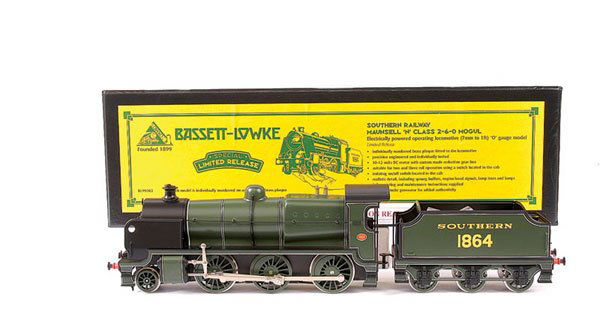 Corgi/Bassett-Lowke 2-6-0 "N Class Mogul": Corgi/Bassett-Lowke 2-6-0 Loco and Tender "N Class Mogul" SR green No.1864, 3-rail Electric. Appears unused and No.111 of a limited edition. Complete with operating instructions and Bassett-Lowke clot