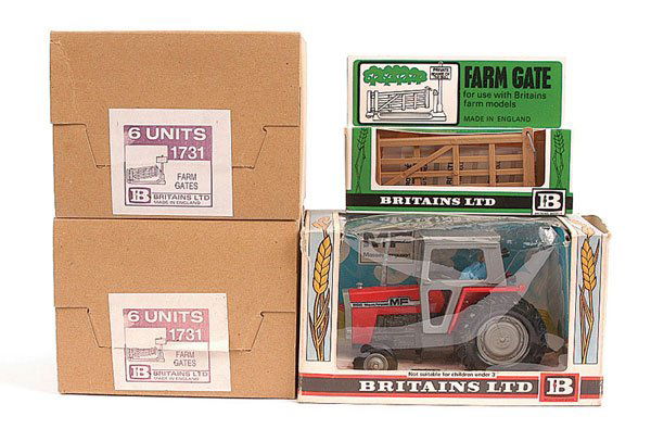 Britains No.9522 Massey Ferguson 595 Tractor: Britains No.9522 Massey Ferguson 595 Tractor - Excellent Plus (paint loss to steering wheel) complete with driver in Good window box and 2 x Retailers Trade Pack of 6 x No.1731 pack of Farm Gates, (1)