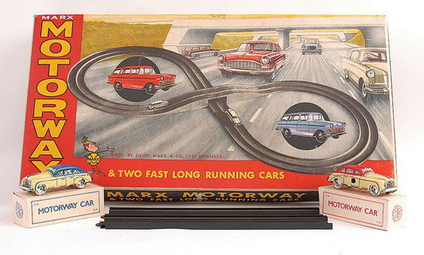 Marx Toys Motorway Set: Marx Toys Motorway Set - comprising, 2 x tinplate clockwork Cars, straight and curved sections of plastic two lane track, to make a figure of eight (quantity unchecked) - contents are Excellent Plus t