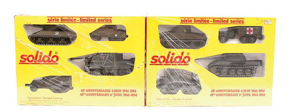 Solido - A Pair of Military Gift Sets: Solido Military Gift Sets - a pair. (1) "40th Anniversary 6th June 1944-1984" - comprising of 4 vehicles including Tanks and 6 x 6 Jeep and (2) same as (1) but containing Half Track and Armoured Car -