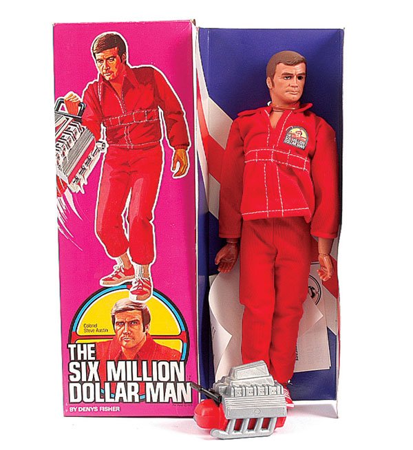 Denys Fisher "Six Million Dollar Man" Figure: Denys Fisher "The Six Million Dollar Man" - Colonel Steve Austin poseable figure - dressed in red suit, complete with engine block and instruction sheets - Mint in Good Plus to Excellent all carded bo