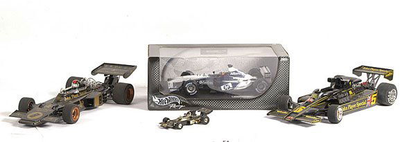 Corgi JPS Formula 1 Racing Car & Others: Corgi John Players Special Formula 1 Racing Car in black along with 2 further John Players Special F1 Models approx. 1/12th scale. Made up kits. All are Excellent, together with Hot Wheels 1/18th scal