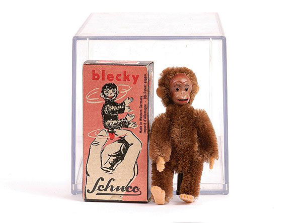 Schuco Blecky Boxed Monkey: Schuco Blecky boxed Monkey, 1950s, tinplate face with painted features, felt ears, hands and feet, brown mohair, minor scratches to face, Schuco printed Becky box No.7305/g, very slight scuffing. N.B.
