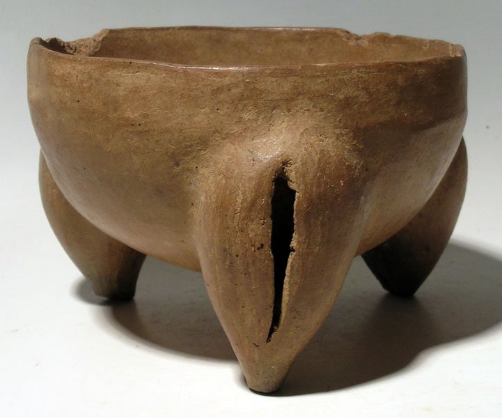 Chiriqui Bowl from Panama: A large Chiriqui tripod bowl from Panama, ca. 1000 – 1500 AD. This unusually large example is 7” in diameter and stands on hollow legs that contain rattles. The buff slip is nicely burnished and s