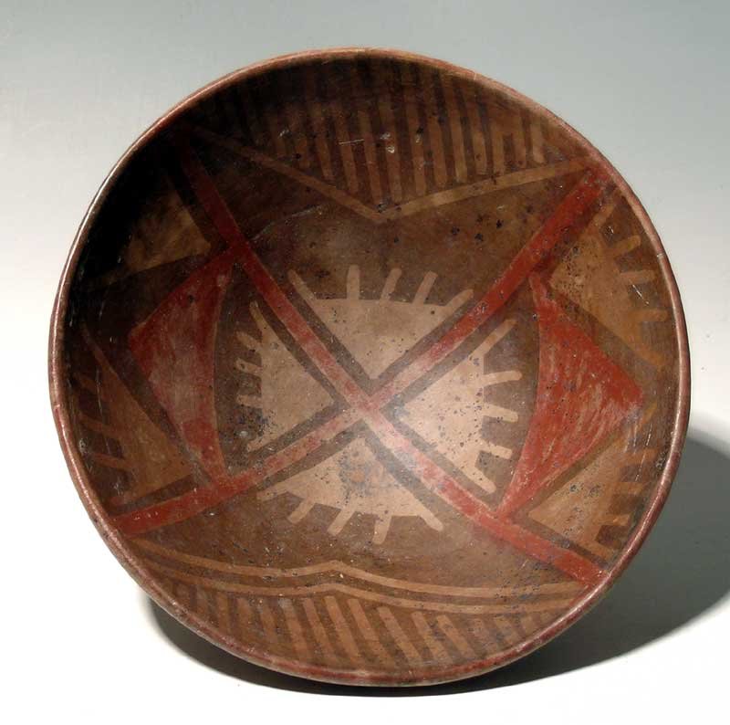 Narino Pedestal Bowl: An excellent Narino polychrome pedestal bowl from the Piartal cultural complex, Colombia, ca. 750 – 1250 AD. This fine example is 8” in diameter and is decorated with stylized geometric bird forms