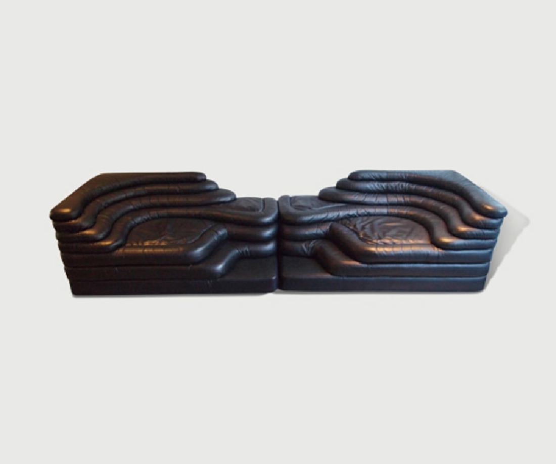 De Sede Terrazza Landscape: Black De Swede sofa, designed by Ubald Klud, two elements one left one right. Date: 1970s Height: 71m Depth: 183cm Width: 152cm
