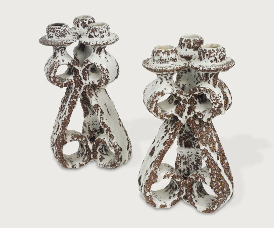 Vallauris Candleticks: Pair of Lava glaze candlesticks designed by Marius Giuge for Vallauris Ceramic , France. Height:34cm Width: 17cm
